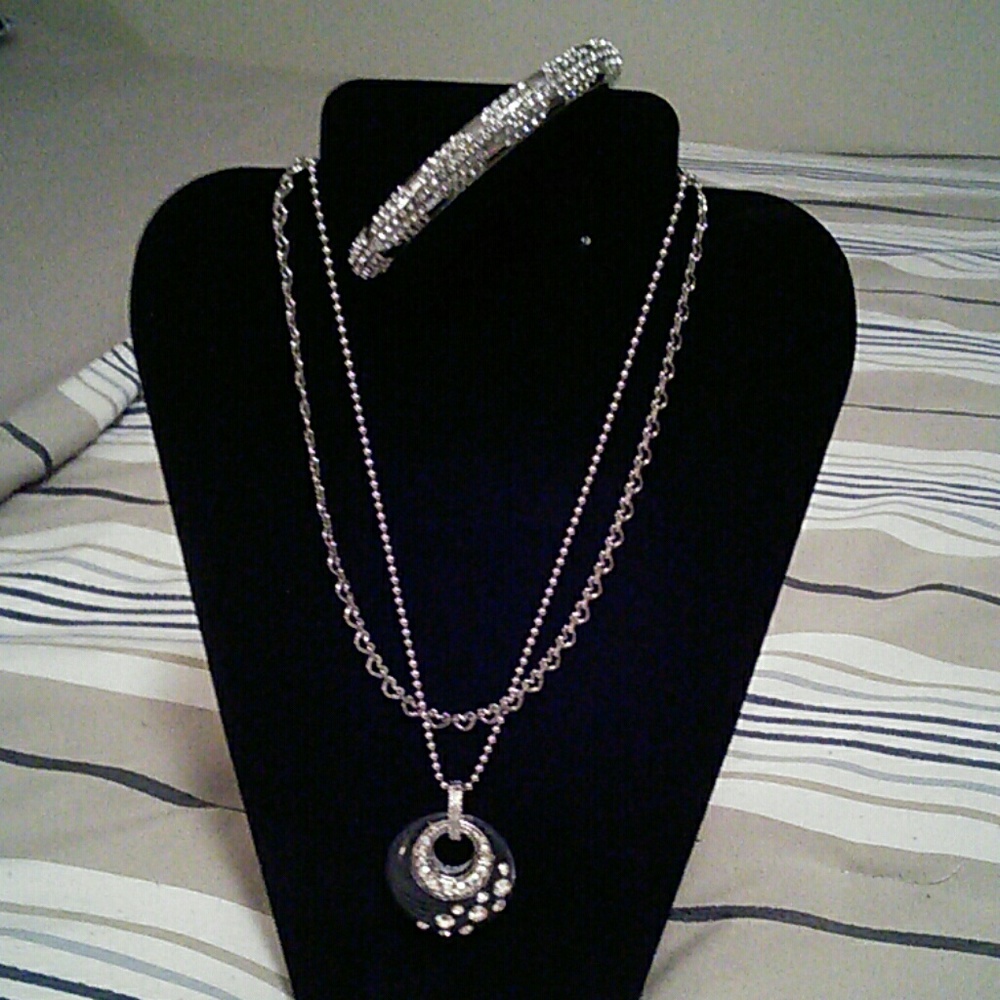 Silver tone bracelet and necklace with rhinestones